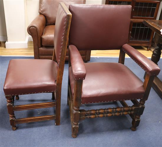 A set of seven 17th century style oak and leather dining chairs, including a pair of carvers